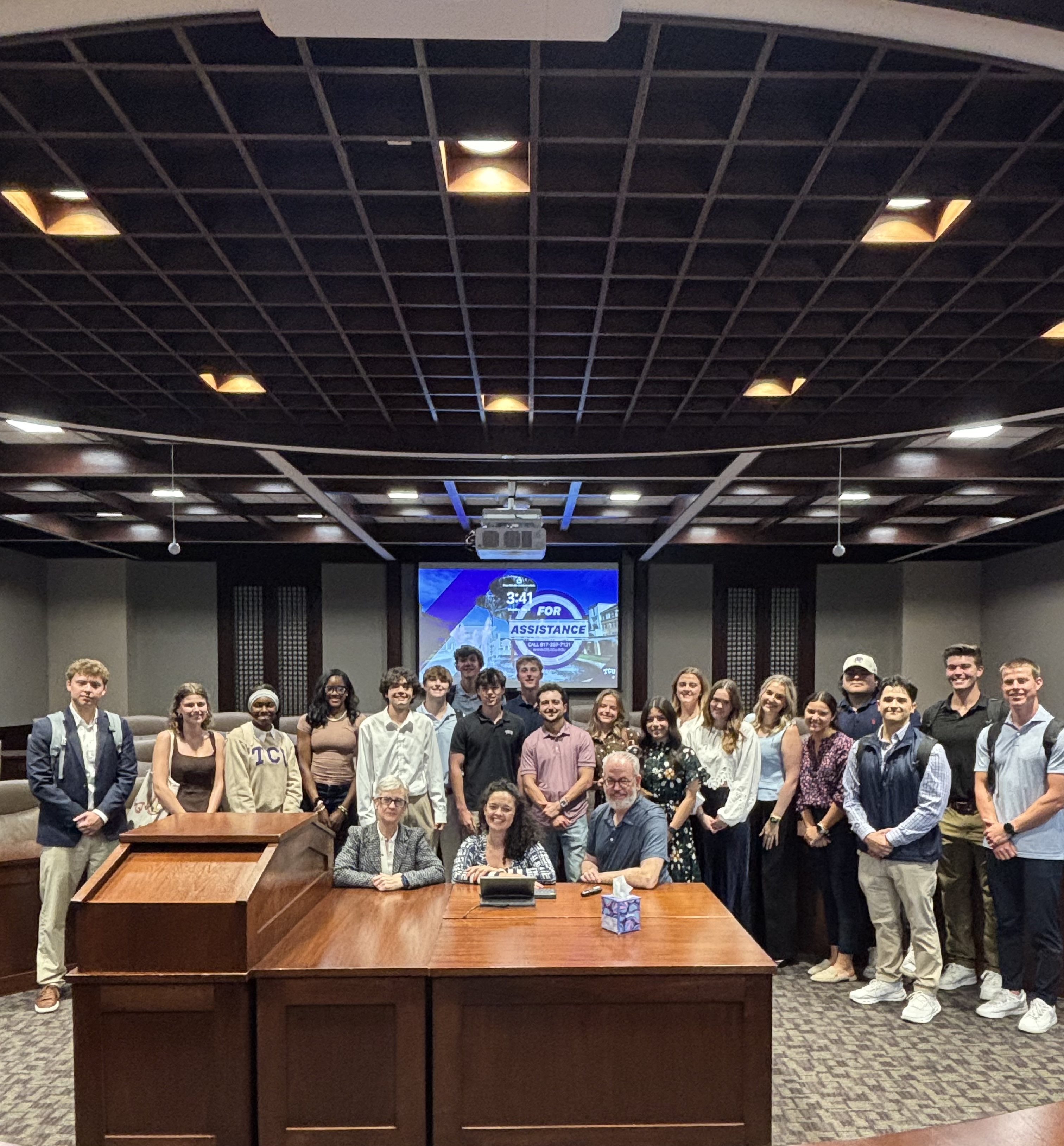TCU students and faculty gather in a classroom as part of Human-Centered AI programming.