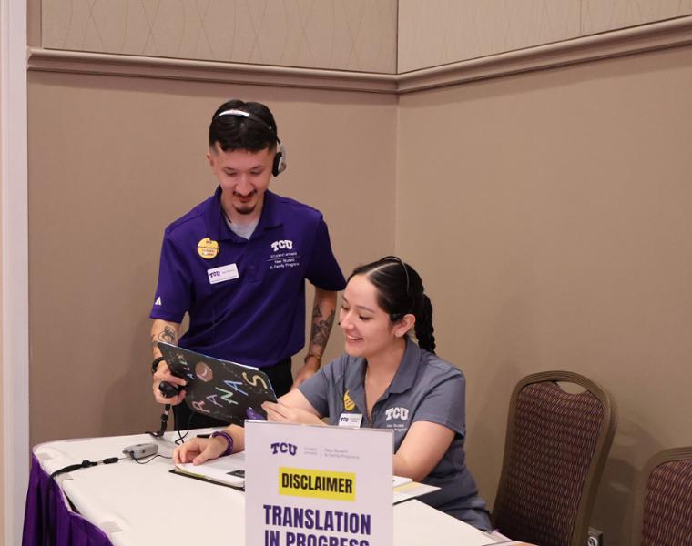 TCU Dulce Sancen and Alex Martinez doing live Spanish translation during TCU's orientation