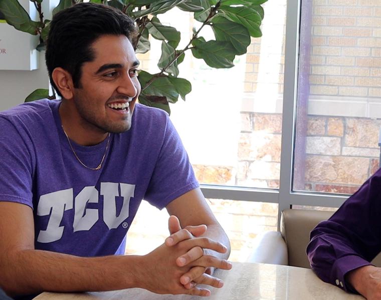 Student and admission counselor working together