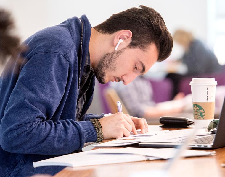 male student working